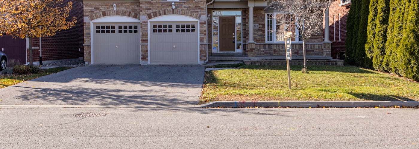 Carriage-style Amarr garage doors on a residential home