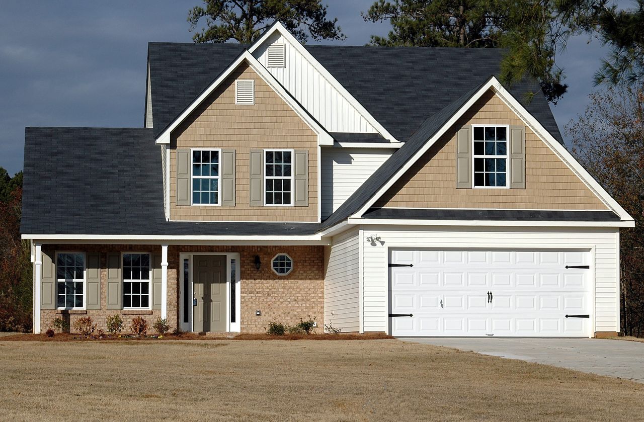 Two-storey home with well-maintained garage door