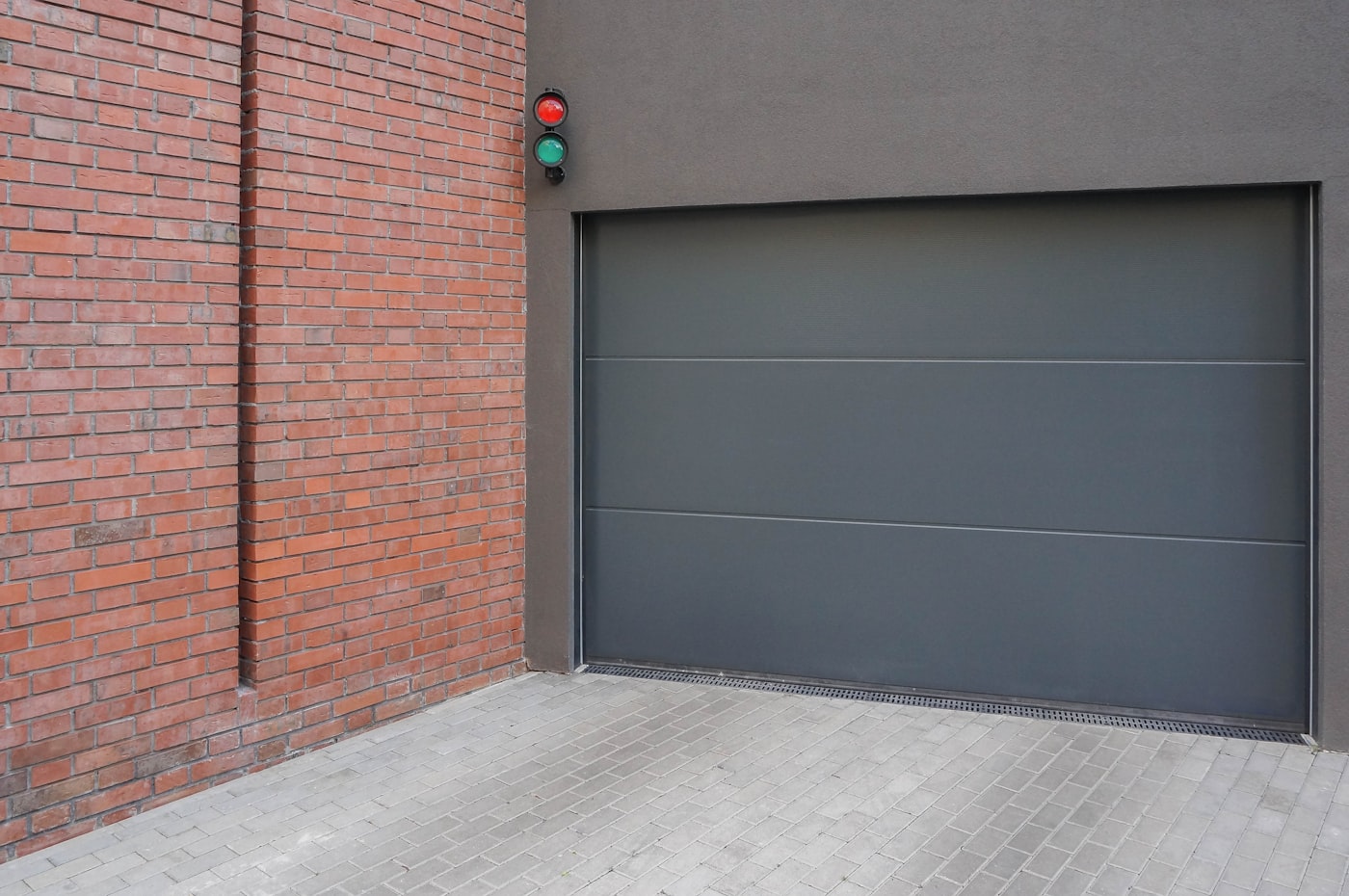 Steel garage door close-up on a brick building